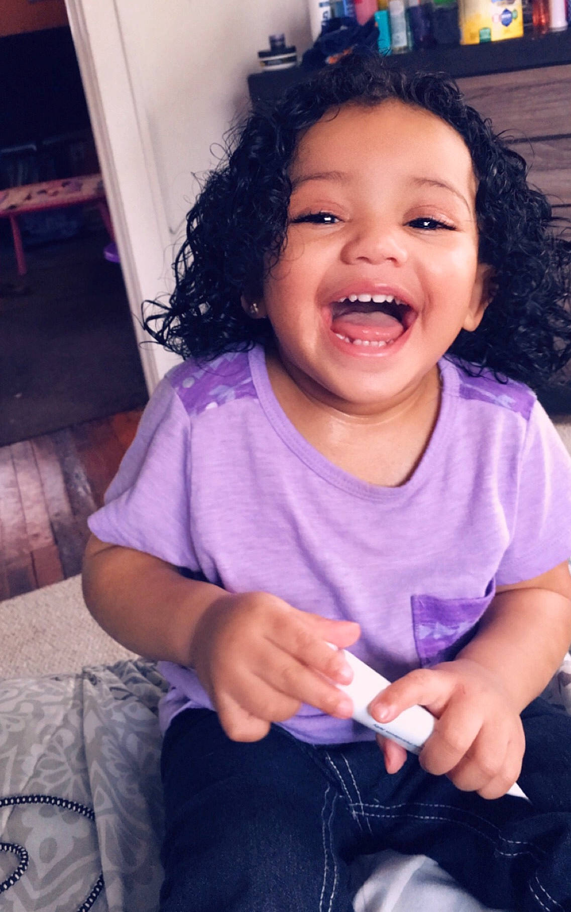 Marianna is registered to the contest to win money with this photo: cheek, child, chin, eye, face, facial_expression, fun, hair, happy, head, joy, lip, nose, organ, people, person, pink, purple, skin, smile