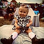 Paisley joined the competition — help win amazing prizes! baby, background_blur, blanket, boots, child, cute, dress, expression, fashion, fun, gathering, hair_bow, outdoor, person, phone, portrait, seated, socks, soft, toddler