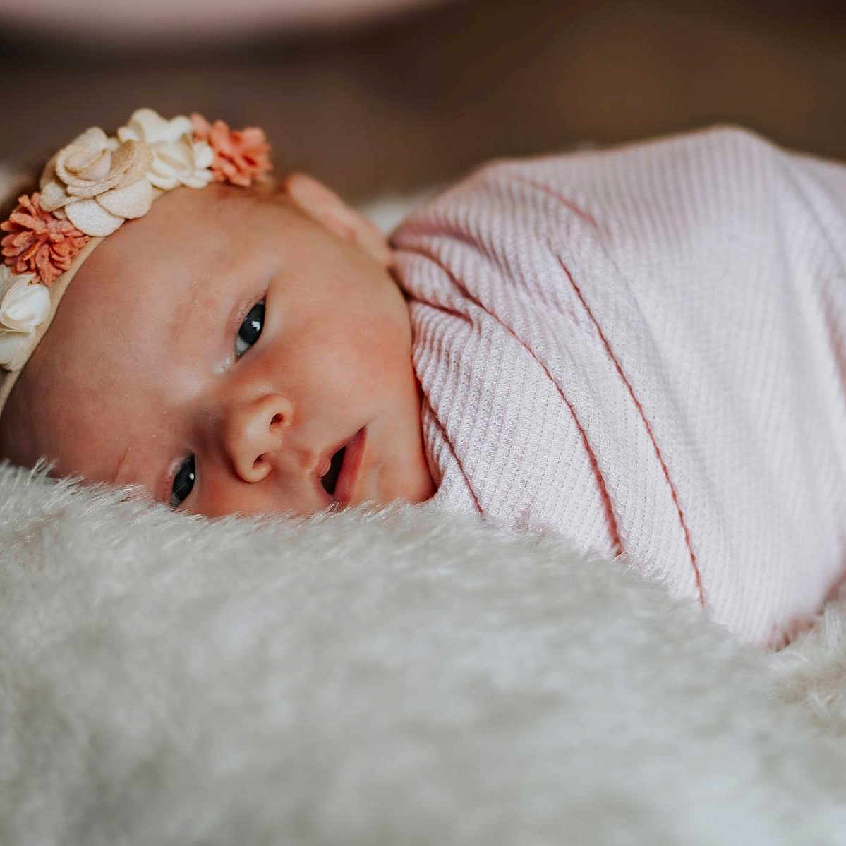 Caelynn joined the competition — help win amazing prizes! baby, blanket, face, happy, head, newborn, person, photography, portrait, sleeping, smile