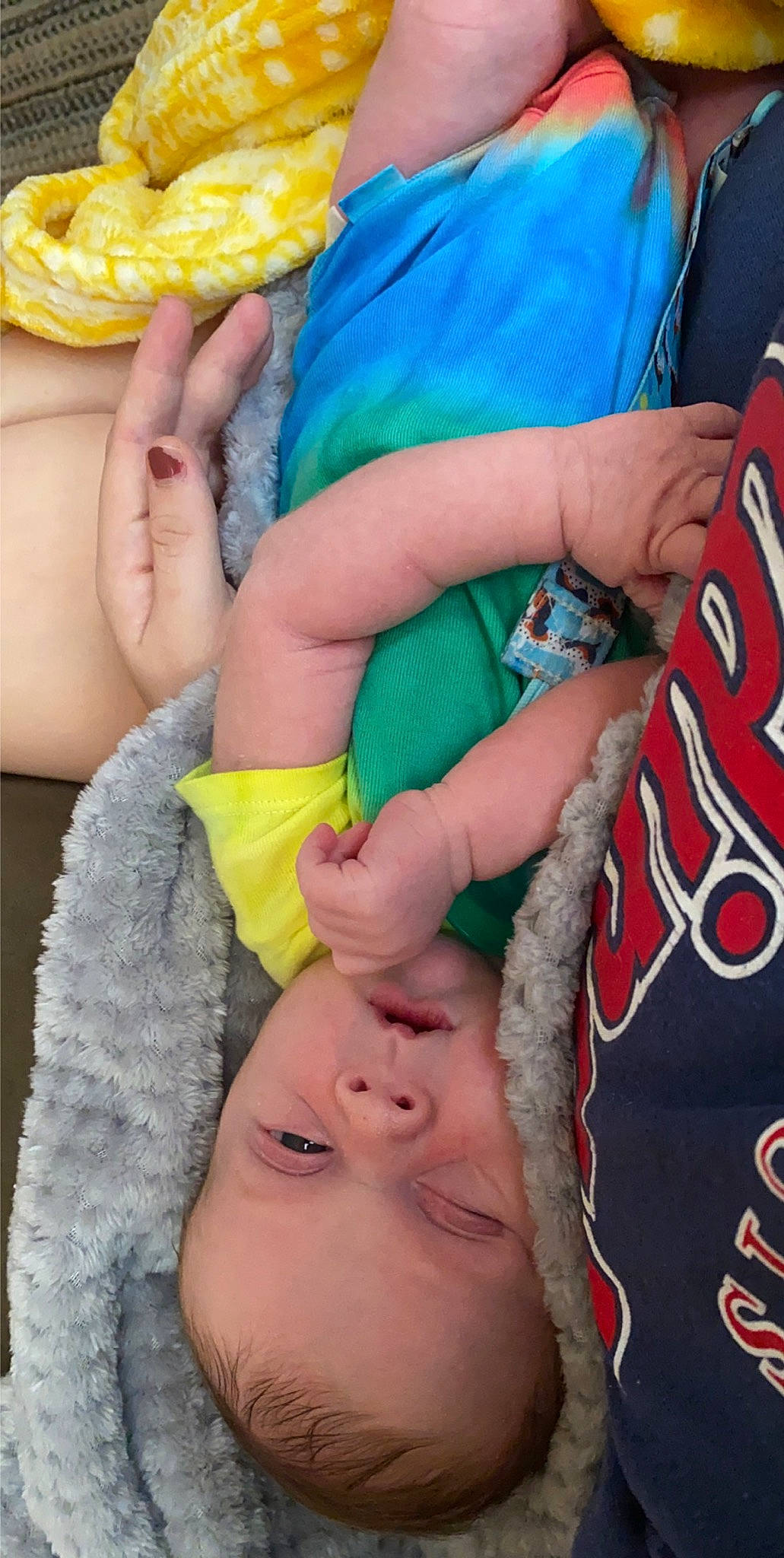 Tucker is registered to the contest to win money with this photo: baby, child, finger, hand, leg, mouth, nail, person, toddler