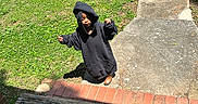 Christopher joined the competition — help win amazing prizes! child, hoodie, grass, concrete, sidewalk, shoes, outdoor, daylight, curious, small, person, casual, greenery, sunlight, shadow, walking, steps, wood, playful, young