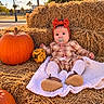 baby, child, infant, sitting, portrait, pumpkin, pumpkin_patch, hay_bale, outdoor, autumn, fall, red_bow, pacifier, blanket, plaid_clothing, white_tights, brown_shoes, smiling, nature, family_photo