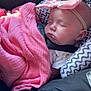 baby, sleeping, car_seat, pink_blanket, headband, bow, child, infant, seatbelt, zigzag_pattern, soft_toys, indoors, cute, peaceful, resting, clothing, fabric, closeup, face, newborn