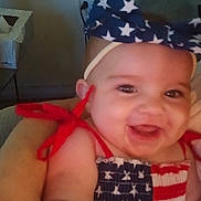 Scarlett joined the competition — help win amazing prizes! baby, child, smiling, patriotic, headband, stars, stripes, red, white, blue, clothing, face, happy, cute, indoor, person, portrait, infant, joyful, closeup