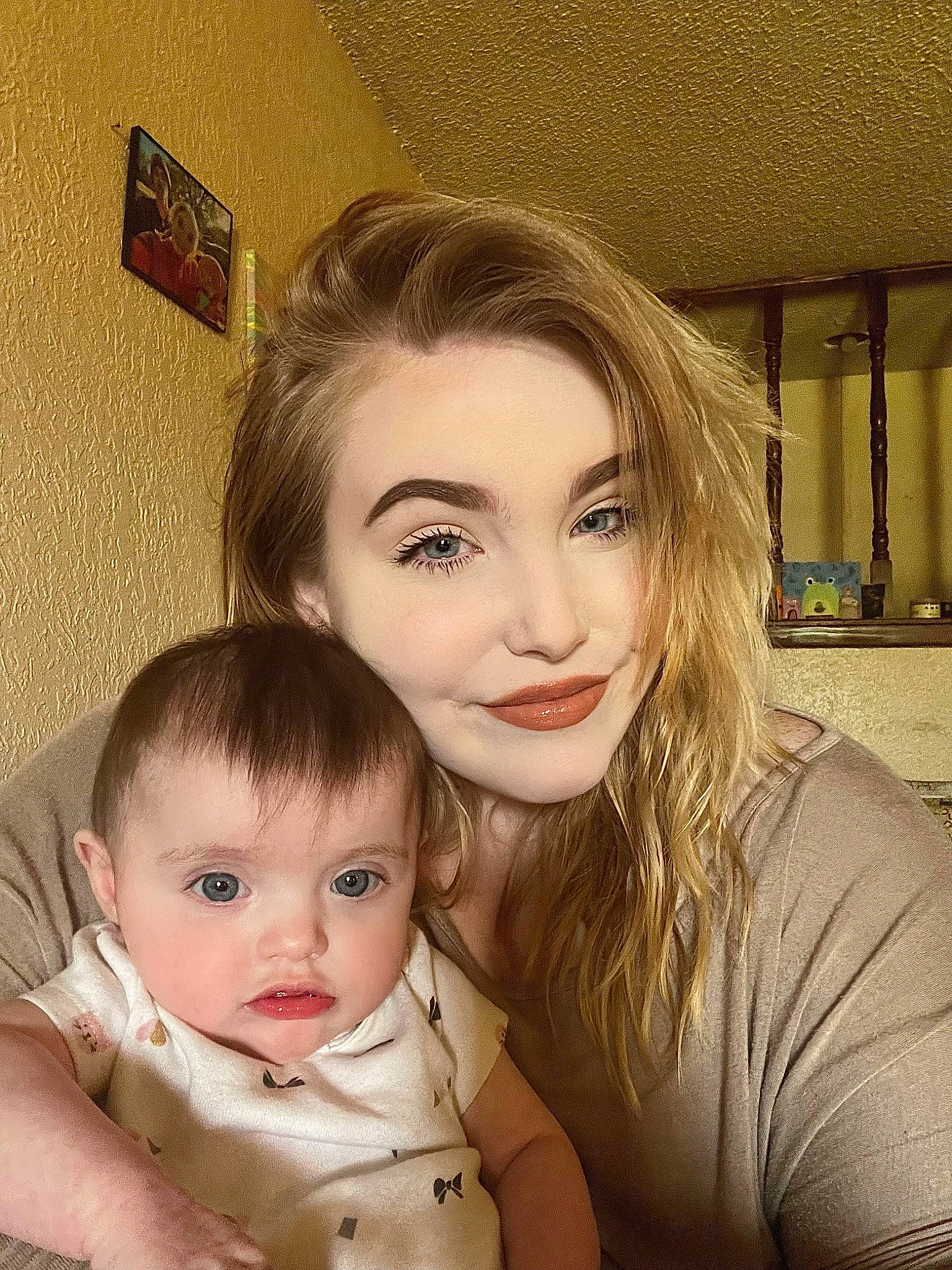 Athena is registered to the contest to win money with this photo: baby, blond, brown_hair, cheek, child, eyelash, flash_photography, fun, gesture, happy, iris, jewellery, joy, layered_hair, lip, makeover, nose, person, picture_frame, skin