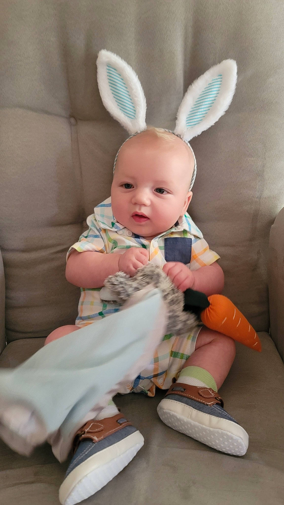 Lucas is registered to the contest to win money with this photo: baby_toddler_clothing, child, doll, dress, ear, fawn, fur, happy, head, human_leg, person, pink, plush, rabbit, skin, sleeve, sock, stuffed_toy, textile, toy