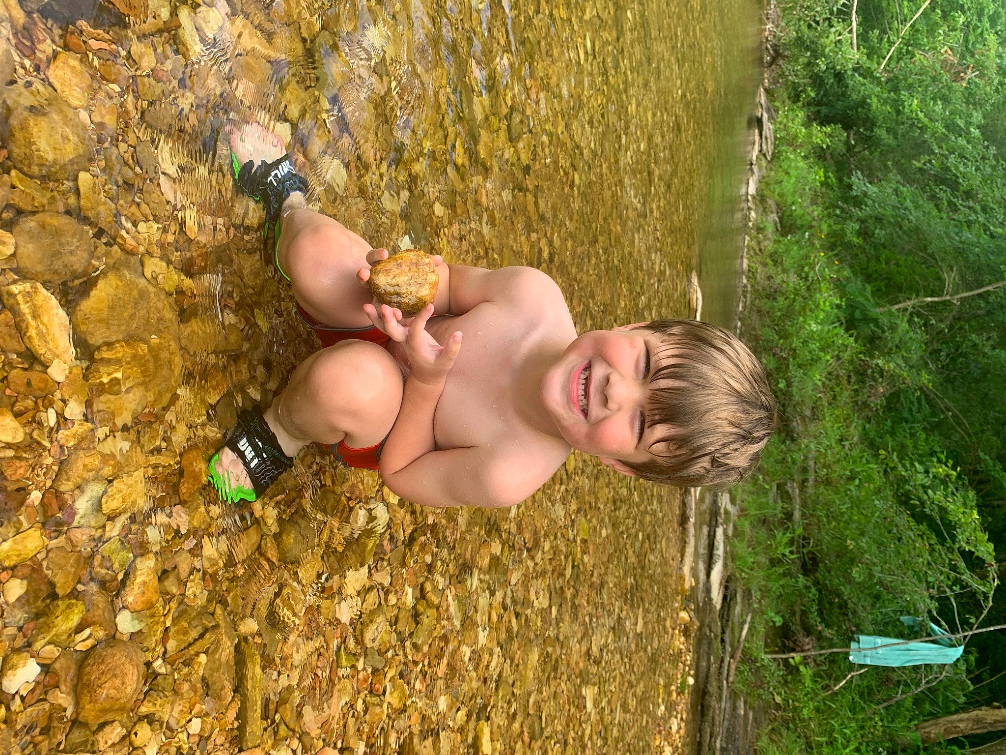 Jase is registered to the contest to win money with this photo: baby, child, finger, flash_photography, fun, grass, grass_family, hand, happy, human_leg, joy, leisure, people_in_nature, person, plant, recreation, smile, soil, thigh, toddler