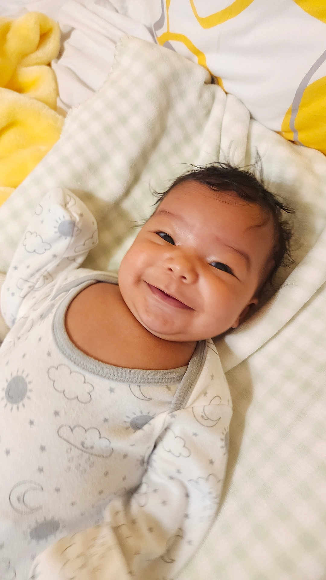 Miosoty joined the competition — help win amazing prizes! baby, infant, smiling, face, onesie, blanket, bed, soft, cute, child, sleepwear, patterned_clothing, happy, lying_down, indoors, portrait, skin, head, young, cozy