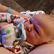 Waylon joined the competition — help win amazing prizes! baby, infant, pacifier, pajamas, person, arm, hand, clothing, indoors, closeup, face, skin, head, sleepwear, comfort, child, newborn, rest, cuddle, human