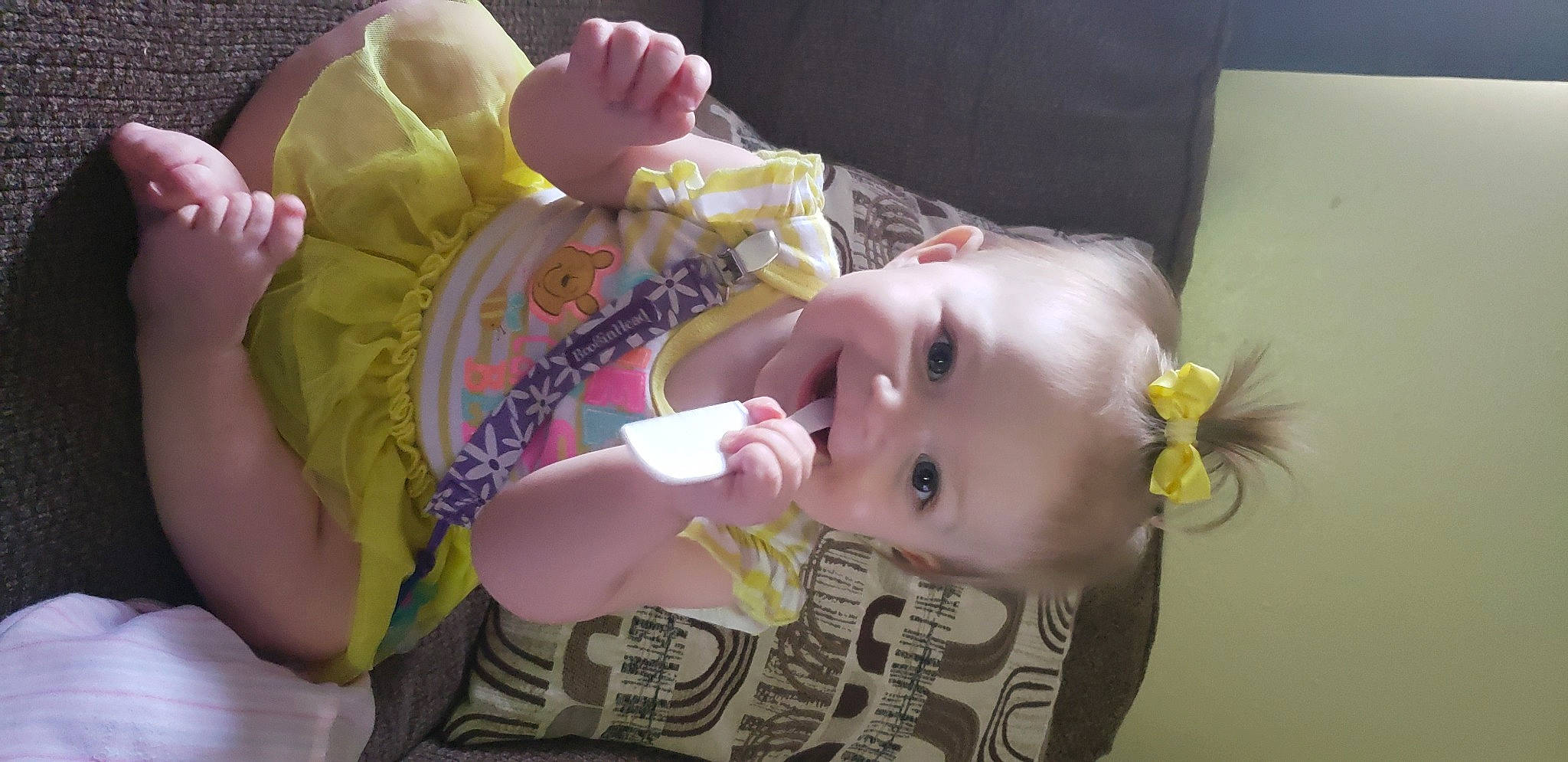 Ireland is registered to the contest to win money with this photo: baby, baby_products, baby_toddler_clothing, cheek, child, ear, eyelash, finger, happy, joy, lip, mouth, nose, person, pink, product, skin, smile, textile, toddler