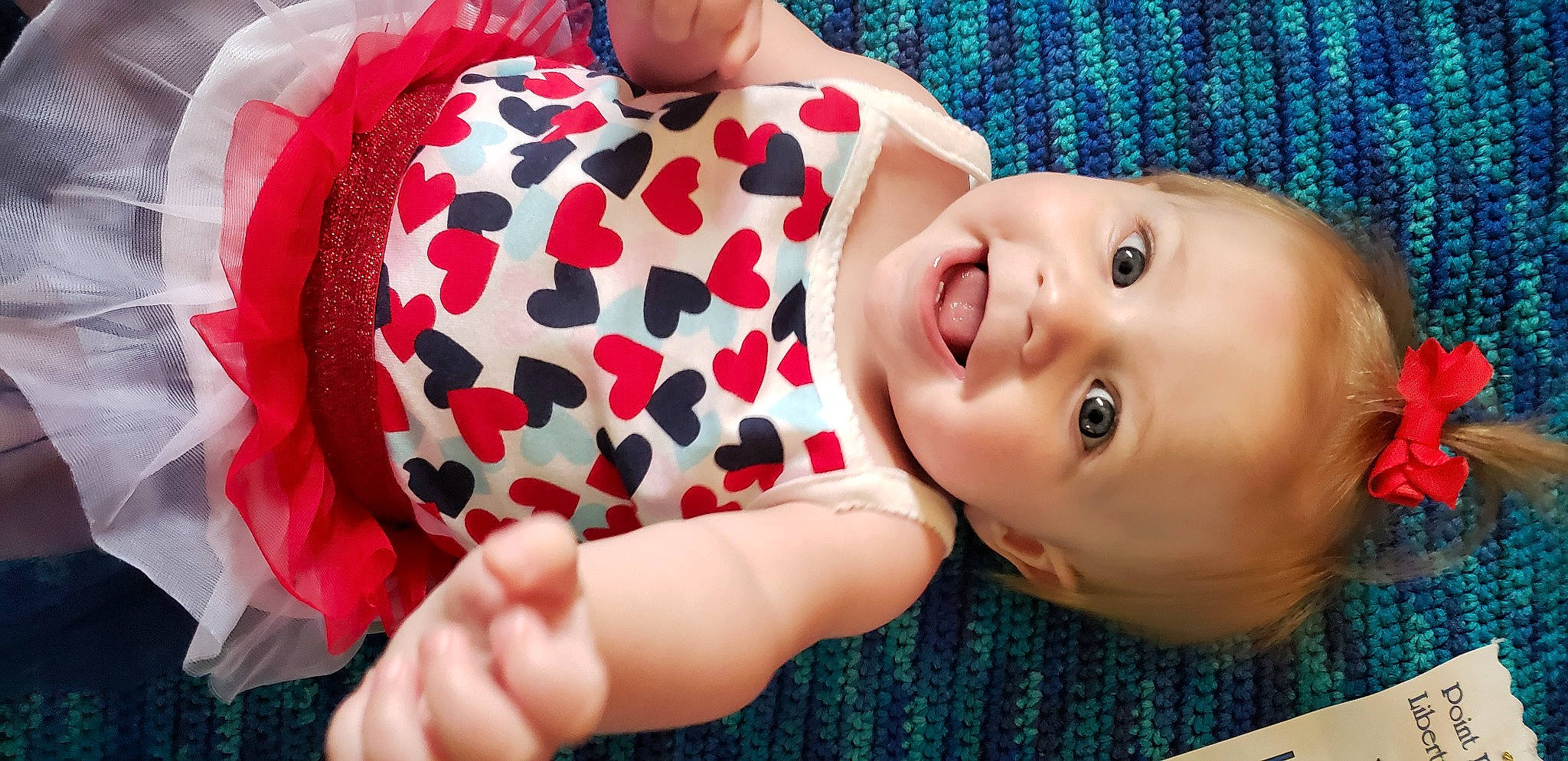 Ireland joined the competition — help win amazing prizes! baby, baby_toddler_clothing, cheek, dress, eyelash, finger, gesture, hand, happy, hat, iris, lip, mouth, neck, nose, person, pink, skin, sleeve, smile