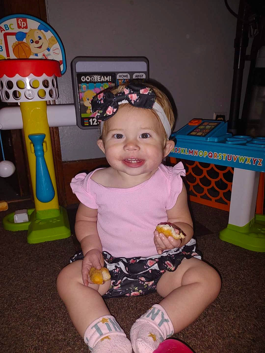 Rosey joined the competition — help win amazing prizes! baby, baby_toddler_clothing, chair, child, event, fun, happy, headwear, human_leg, joy, knee, lap, party, person, picture_frame, room, shorts, sitting, smile, sock