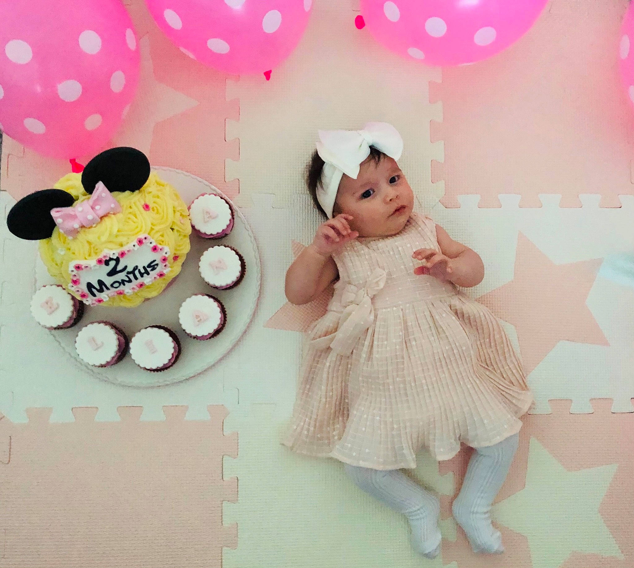 Eliana is registered to the contest to win money with this photo: art, baby_toddler_clothing, child, event, font, graphics, happy, headwear, magenta, mammal, party_supply, pattern, peach, person, pink, polka_dot, product, sleeve, sweetness, textile