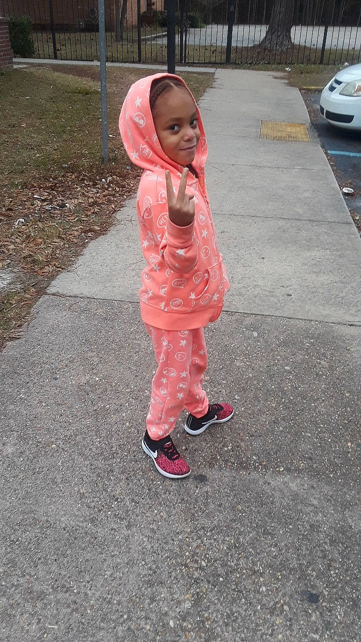 Ashanti joined the competition — help win amazing prizes! asphalt, child, fun, girl, joy, leg, person, pink, play, recreation, red, standing, toddler, vacation