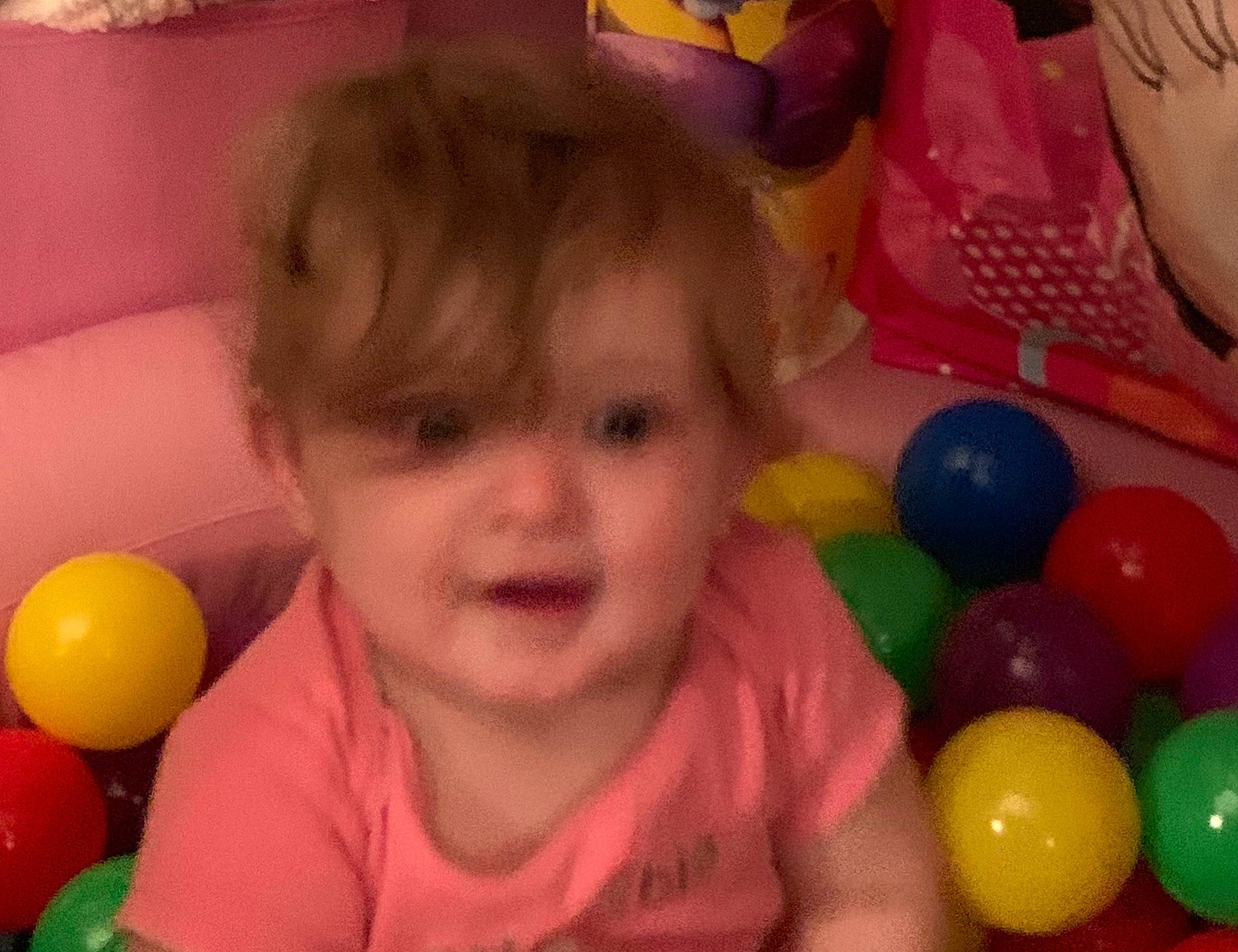 Fiona is registered to the contest to win money with this photo: baby, baby_playing_with_toys, baby_toys, ball_pit, child, fun, person, play, smile, toddler, toy