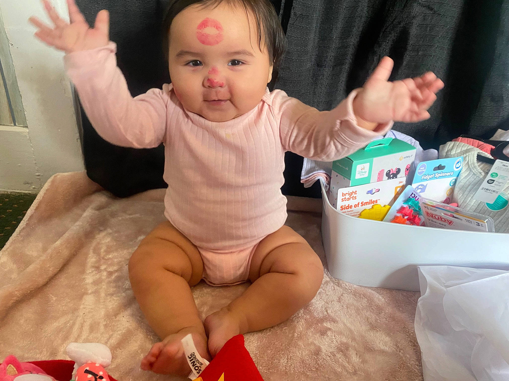 Imaani is registered to the contest to win money with this photo: baby, baby_toddler_clothing, cheek, child, comfort, finger, fun, gesture, happy, human_leg, knee, lap, person, room, sitting, skin, sleeve, smile, thigh, thumb