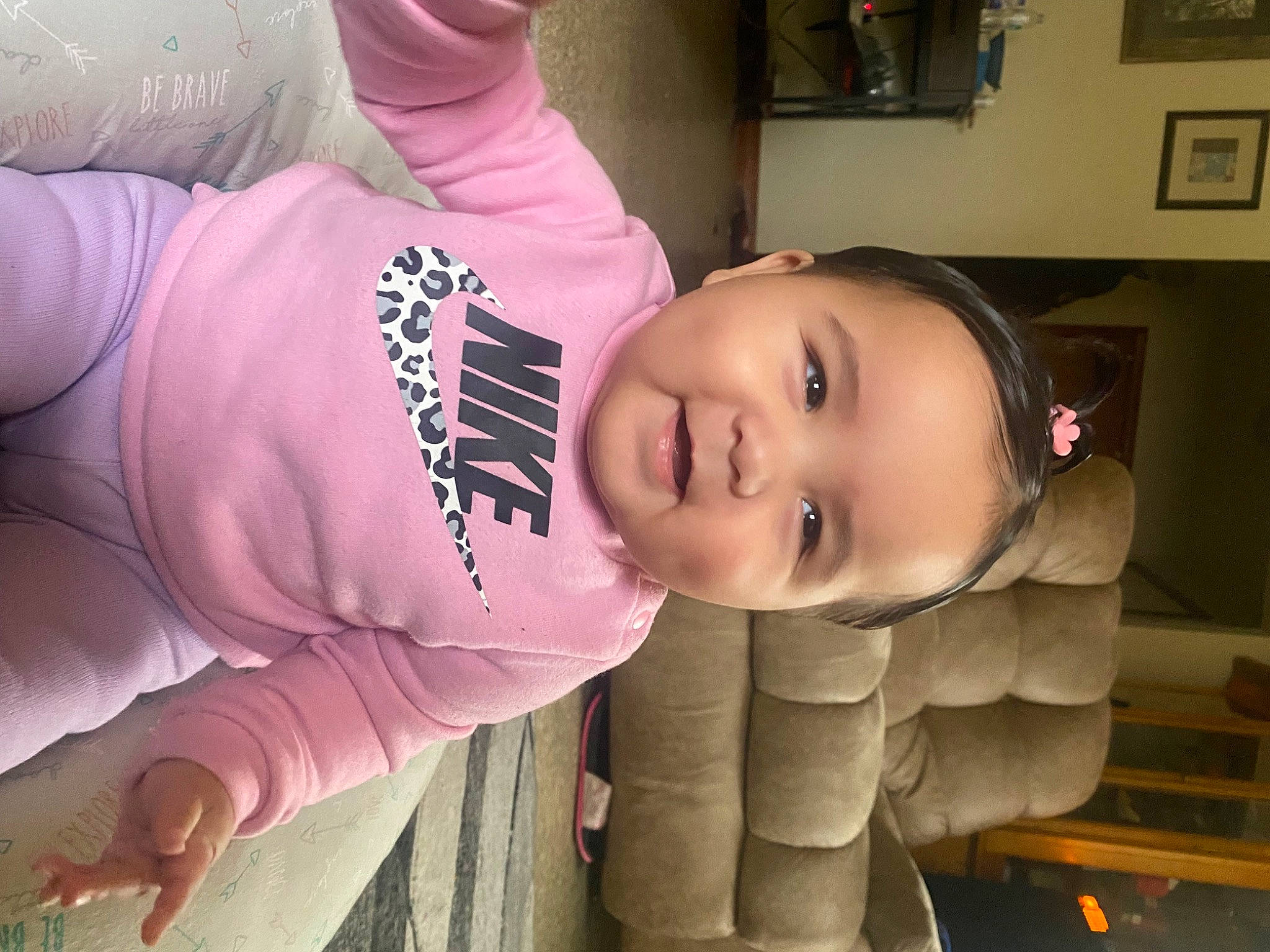 Imaani is registered to the contest to win money with this photo: baby_toddler_clothing, cheek, child, chin, cool, eye, face, flash_photography, fun, hairstyle, happy, head, joy, magenta, person, picture_frame, room, skin, sleeve, smile