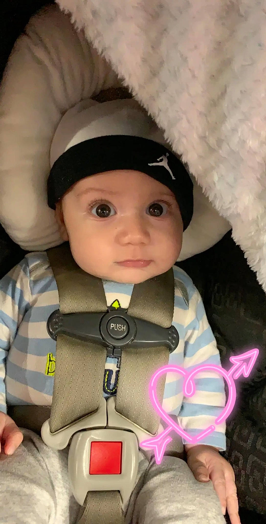 Camden is registered to the contest to win money with this photo: baby, baby_in_car_seat, car_seat, child, headwear, person, toddler, toy