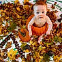 baby, pumpkin, autumn_leaves, fall, child, nature, orange, leaf, sitting, cute, seasonal, harvest, outdoor, playful, barefoot, skin, holiday, decoration, harvest_festival, festive