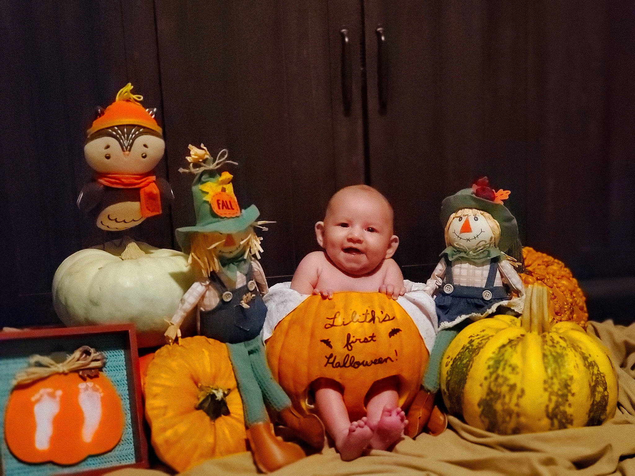 Lilith is registered to the contest to win money with this photo: baby, calabaza, child, cucurbita, event, gourd, happy, hat, natural_foods, orange, person, plush, pumpkin, room, smile, squash, stuffed_toy, toddler, toy, vegetable