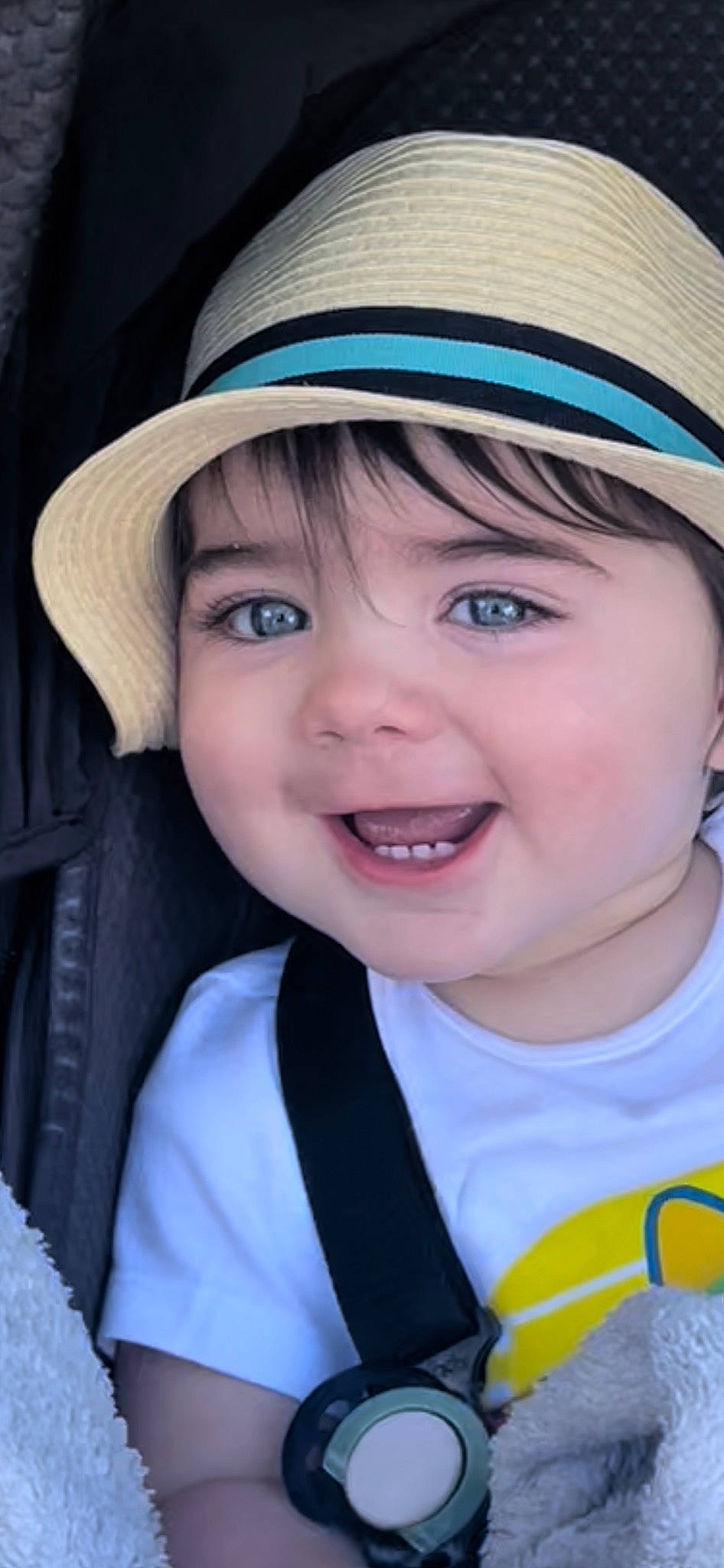 Charlie is registered to the contest to win money with this photo: azure, cap, cheek, chin, clothing, eye, eyebrow, face, facial_expression, hairstyle, hat, headwear, joy, lip, mouth, nose, organ, outerwear, person, photograph