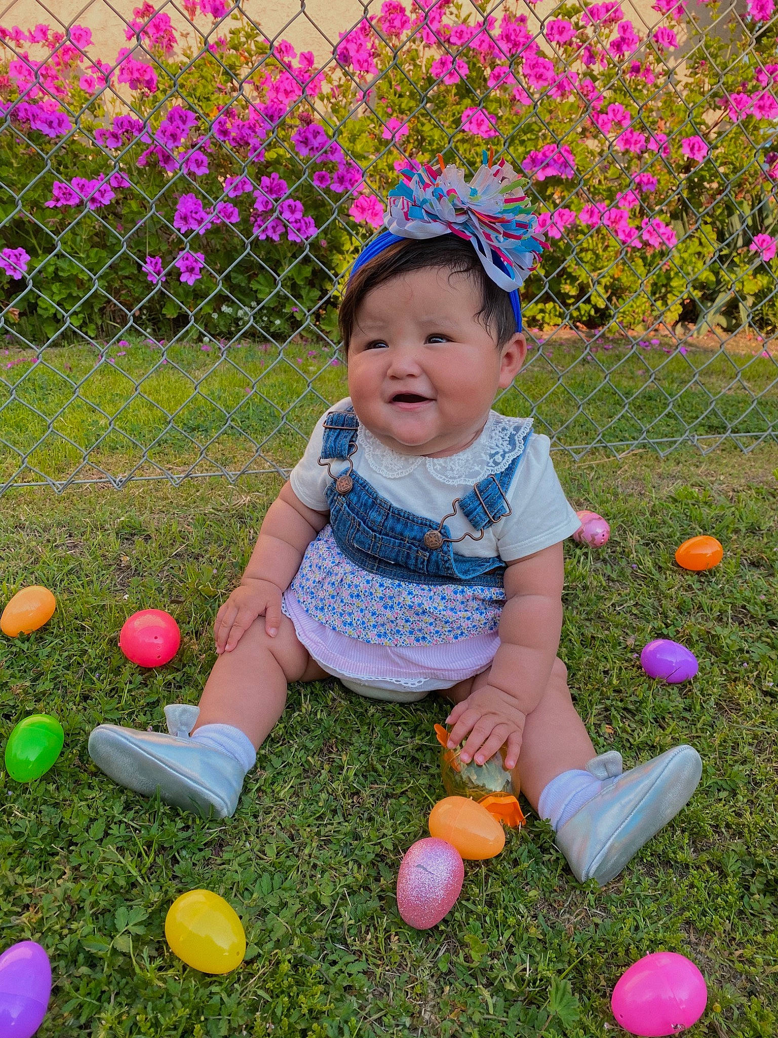 Celine is registered to the contest to win money with this photo: child, easter, easter_egg, flower, fun, grass, holiday, joy, person, pink, plant, play, purple, spring, toddler
