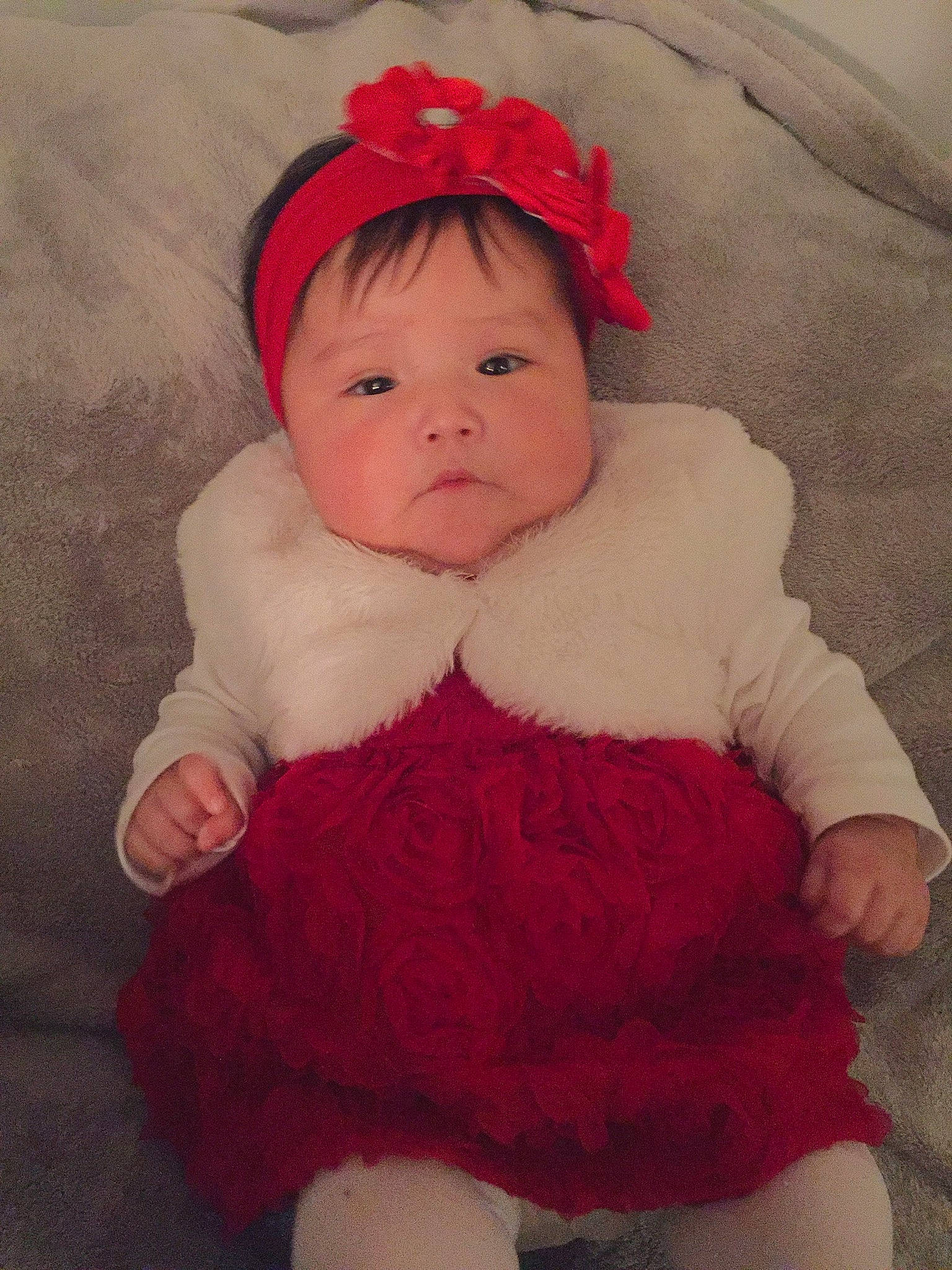 Celine joined the competition — help win amazing prizes! baby, baby_toddler_clothing, cheek, child, clothing, fur, hair_accessory, head, headgear, person, pink, red, skin, toddler, wool