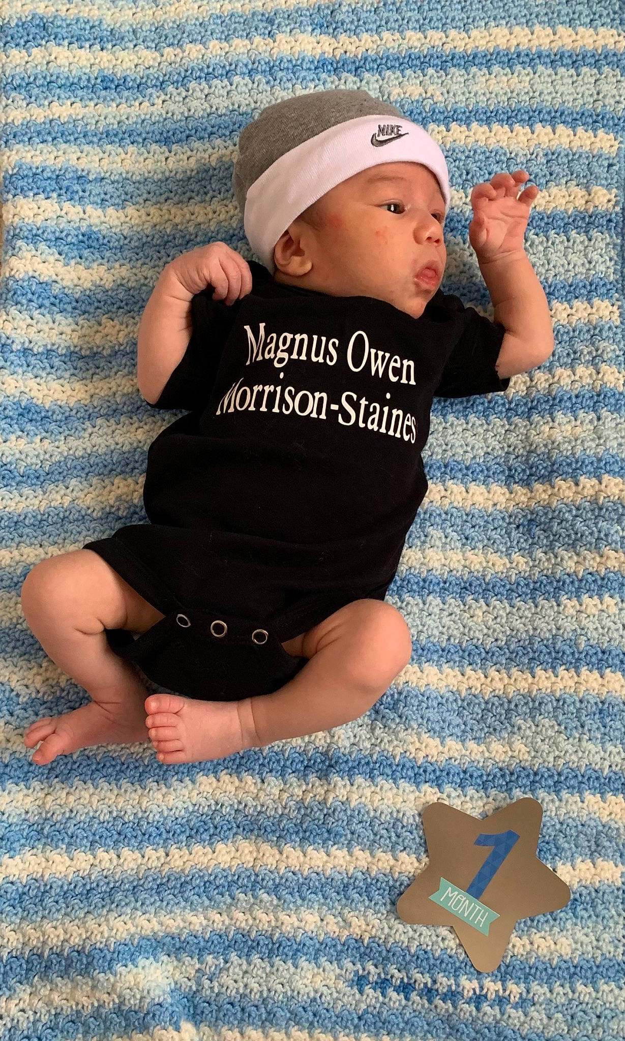 Magnus joined the competition — help win amazing prizes! baby, baby_toddler_clothing, baseball_cap, blue, cap, child, comfort, elbow, electric_blue, flash_photography, headwear, human_leg, knee, pattern, person, sitting, skin, sleeve, t_shirt, thigh