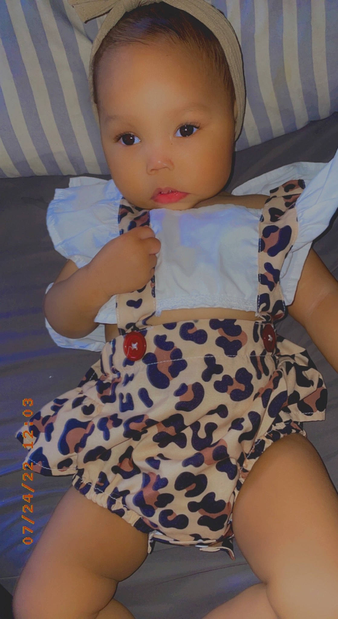 Adelynn is registered to the contest to win money with this photo: baby, baby_toddler_clothing, blond, child, comfort, fashion_design, finger, human_leg, joint, knee, lip, pattern, person, shoulder, sitting, skin, sleeve, thigh, toddler, trunk