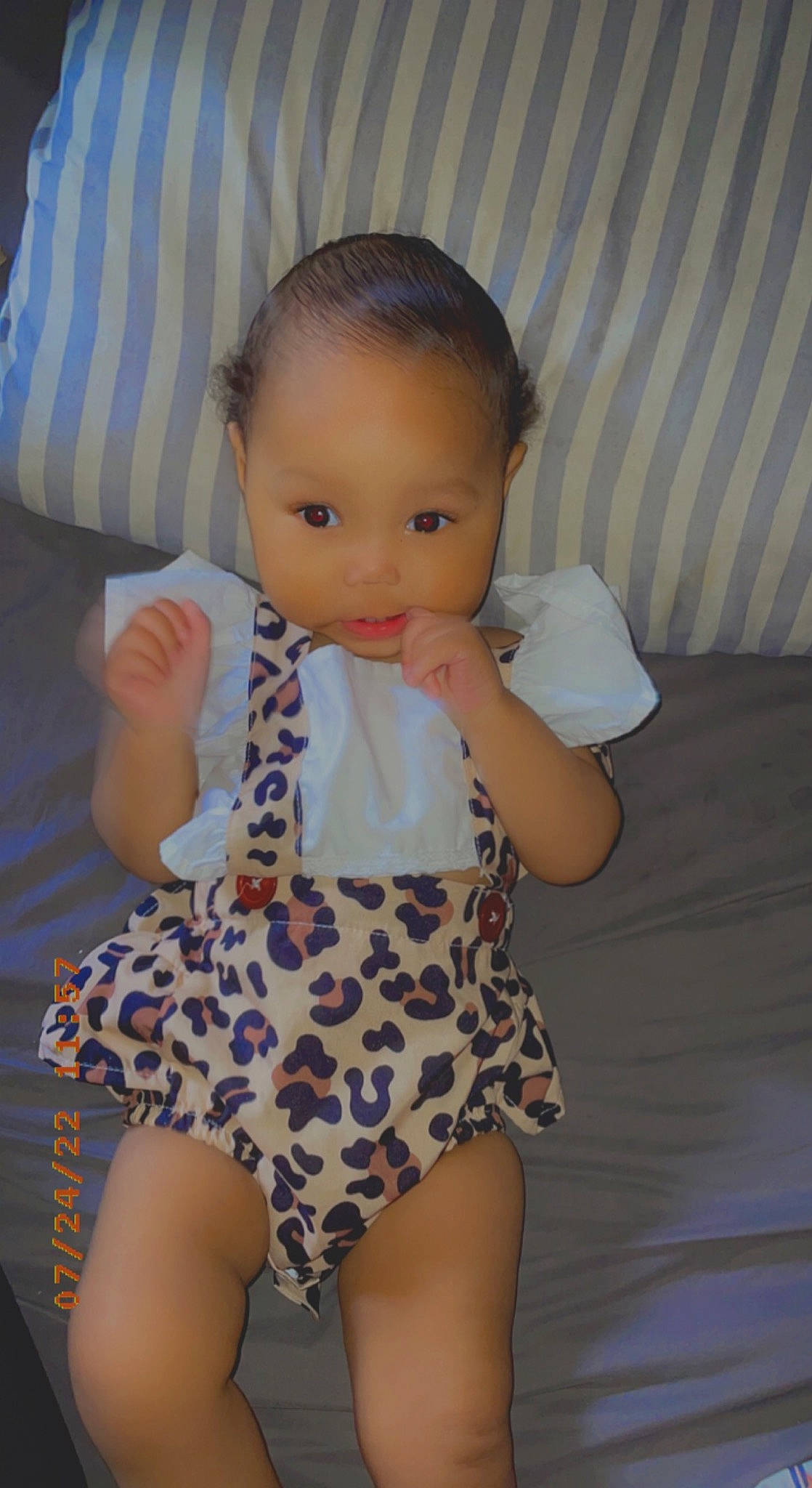 Adelynn is registered to the contest to win money with this photo: arm, baby_toddler_clothing, cheek, eye, face, facial_expression, hair, hairstyle, head, human_body, iris, joint, leg, lip, mouth, neck, nose, person, shoulder, skin