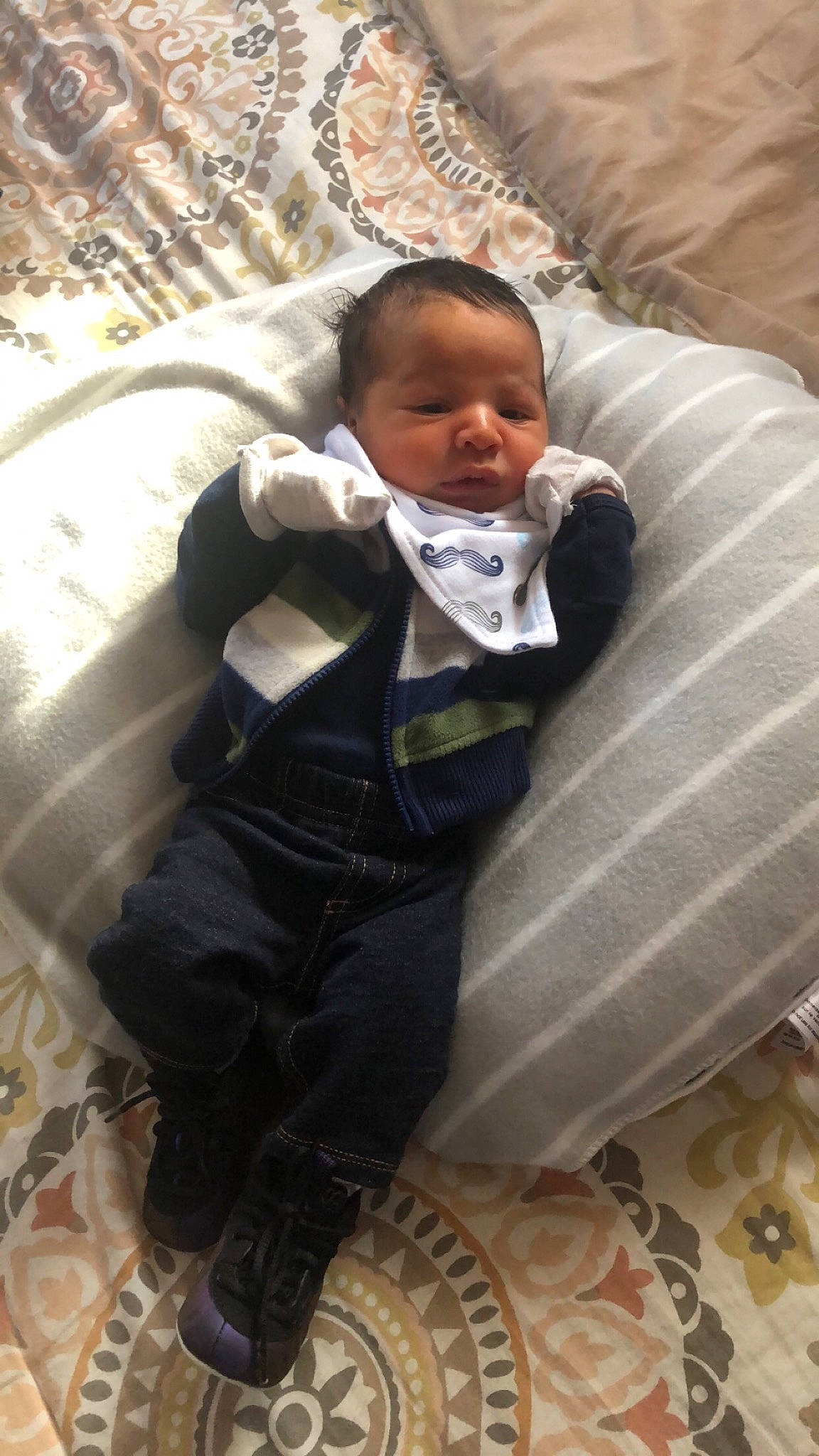 Armando joined the competition — help win amazing prizes! baby, baby_products, baby_toddler_clothing, child, comfort, formal_wear, fun, grass, happy, linens, mammal, person, room, sitting, textile, toddler, tree, vertebrate, wood