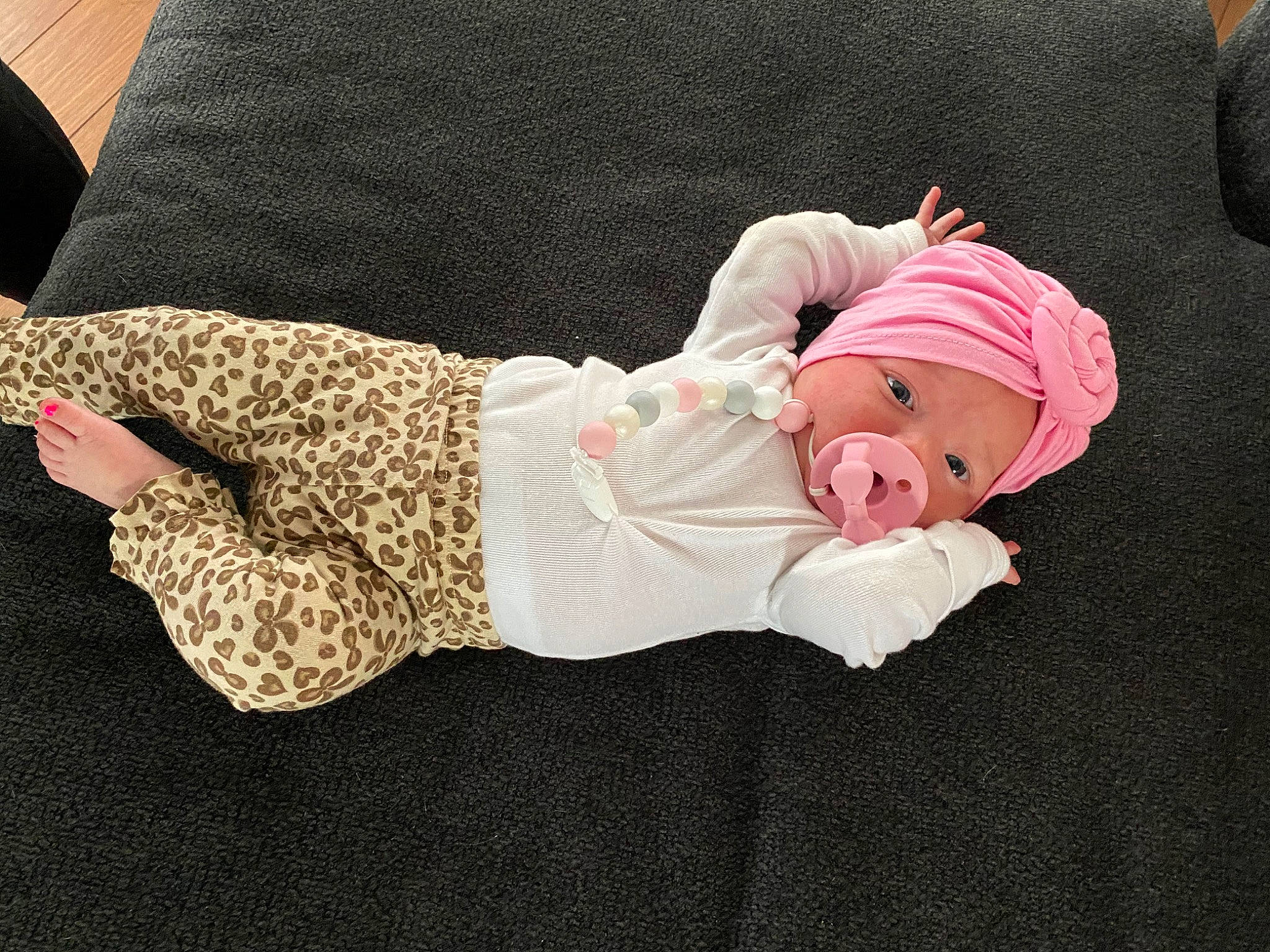 Sutton joined the competition — help win amazing prizes! baby, baby_products, baby_toddler_clothing, beanie, bonnet, child, costume_accessory, headwear, person, pink, sleeve, toddler