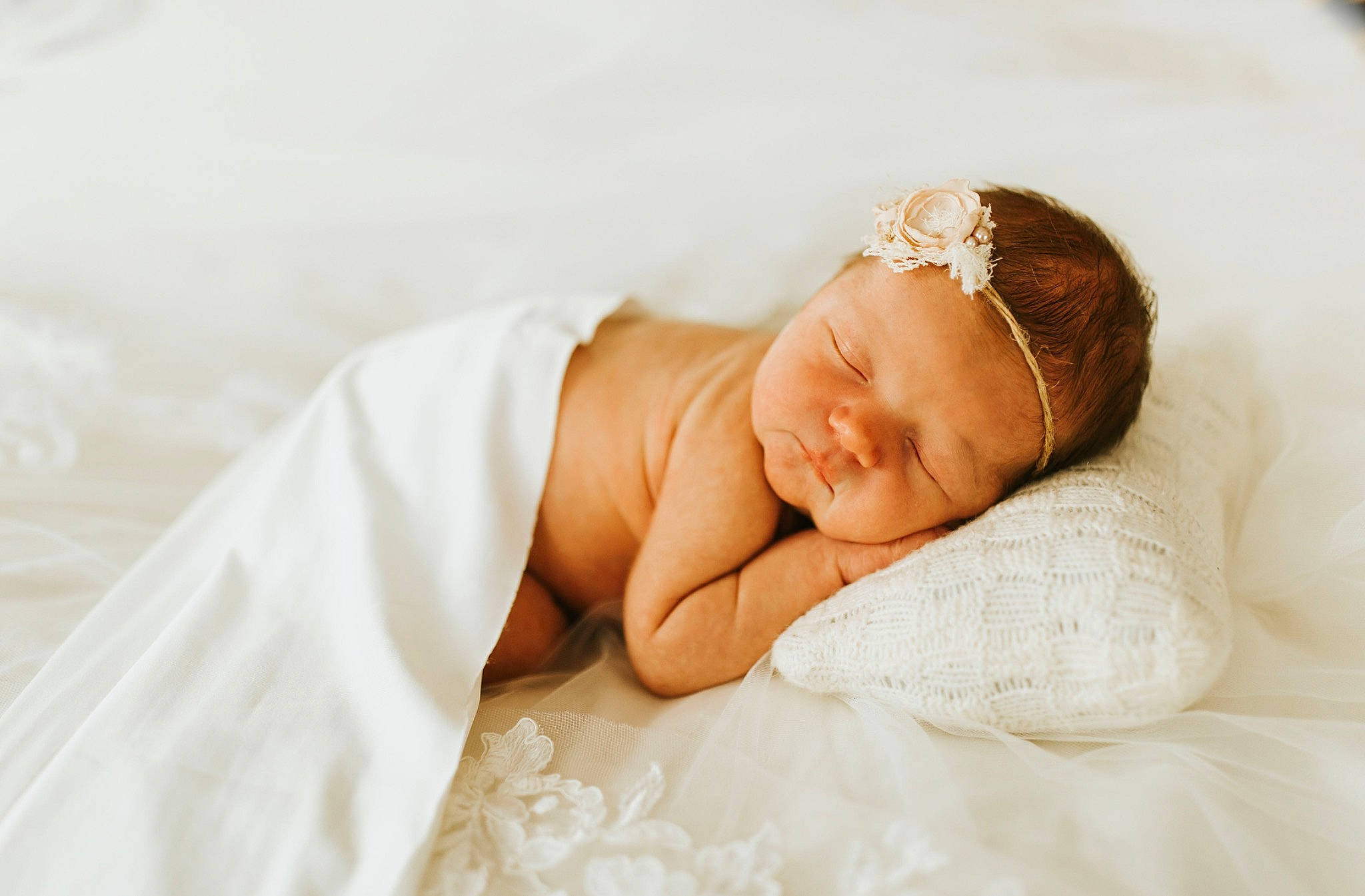 Sutton is registered to the contest to win money with this photo: baby, baby_sleeping, baby_toddler_clothing, beige, bonnet, bridal_accessory, child, comfort, costume_accessory, embellishment, fashion_accessory, hair_accessory, headband, headgear, headpiece, jewellery, nap, person, portrait_photography, skin