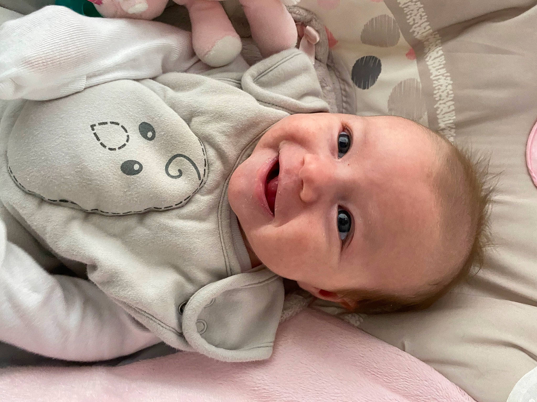 Sutton is registered to the contest to win money with this photo: baby, baby_products, baby_toddler_clothing, cheek, child, comfort, eye, facial_expression, human, joy, linens, lip, mouth, nose, organ, person, product, skin, toddler