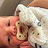 Kaden is registered to the contest to win money with this photo: baby, blanket, child, closeup, cozy, cute, expression, face, hand, human, infant, love, newborn, pacifier, portrait, skin, sleepy, soft, tender, wrapped