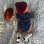 baby, infant, football, nfl, onesie, hat, beanie, socks, quilt, bed, lying_down, child, sport, pattern, textile, indoor, cute, soft, small, resting