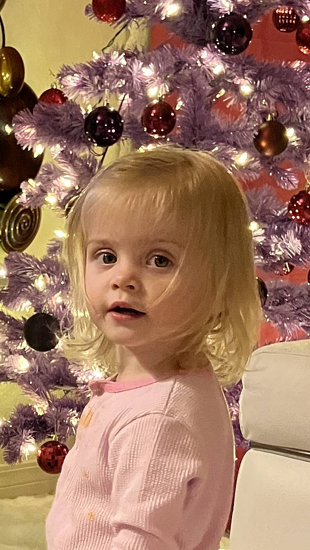 Ivory Rose is registered to the contest to win money with this photo: beauty, cheek, christmas, christmas_decoration, christmas_ornament, christmas_tree, doll, event, eyelash, happy, holiday, holiday_ornament, iris, long_hair, magenta, ornament, person, pink, toy, white