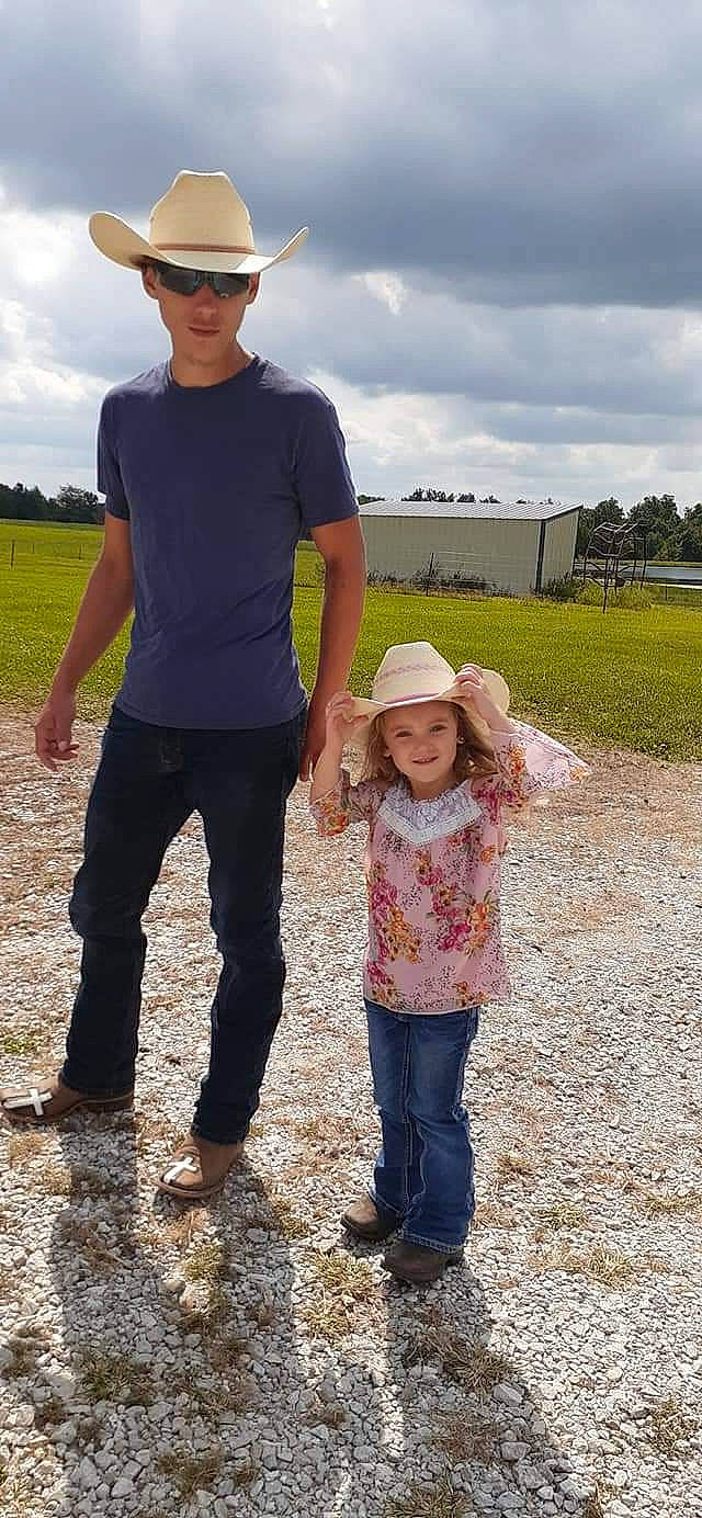 Shyanne joined the competition — help win amazing prizes! cap, clothing, cloud, face, facial_expression, gesture, goggles, grass, happy, hat, headwear, human, joy, leaf, people_in_nature, person, plant, sky, standing, sun_hat