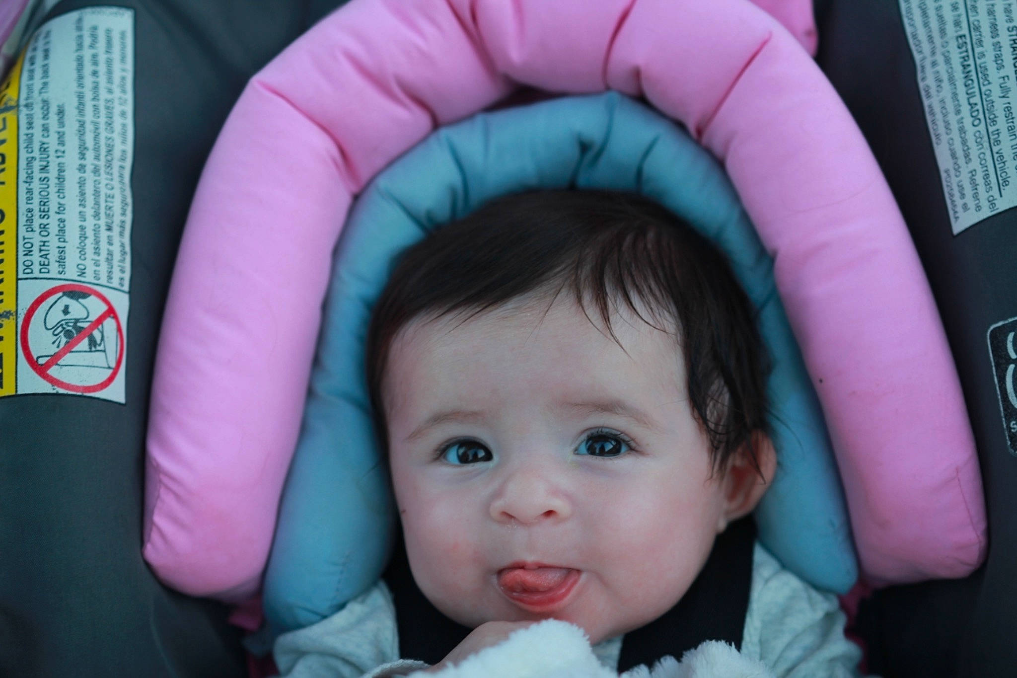 Esmeé is registered to the contest to win money with this photo: baby, blue, cheek, comfort, cool, eyebrow, finger, iris, mammal, mouth, nose, organ, person, photograph, pink, product, purple, skin, textile, toddler