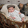 Yohannes is registered to the contest to win money with this photo: baby, blanket, carriage, child, childhood, clothing, cozy, cute, decor, expression, furniture, hat, indoors, plush, portrait, resting, soft, teddy_bear, vintage, wicker