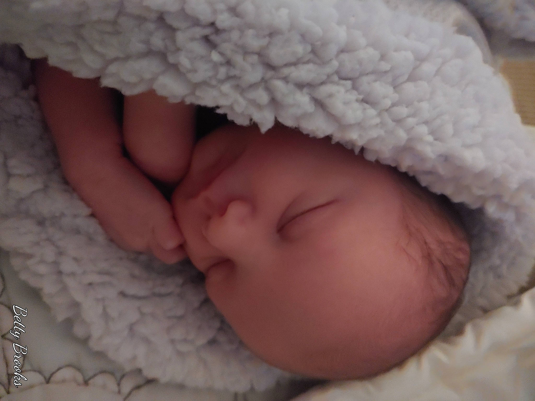 Konnor joined the competition — help win amazing prizes! arm, baby, baby_sleeping, baby_toddler_clothing, cap, cheek, comfort, eye, eyebrow, eyelash, finger, hand, headgear, iris, lip, nose, person, pink, skin, textile