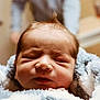newborn, baby, infant, blanket, close_up, face, sleeping, soft_texture, wrapped, cuddly, hair, person, indoor, blurred_background, toddler, child, cozy, cute, portrait, newborn_baby