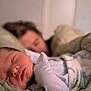 baby, sleeping, blanket, bed, cozy, rest, newborn, person, adult, soft, indoor, portrait, closeup, face, family, comfort, relaxation, warm, cuddle, parent