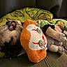 animal, blanket, closed_eyes, cozy, cute, fabric, fur, grinch, indoors, nose, paw, pet, plush_toy, pug, puppy, relaxation, resting, sleeping, snuggled, soft_toy