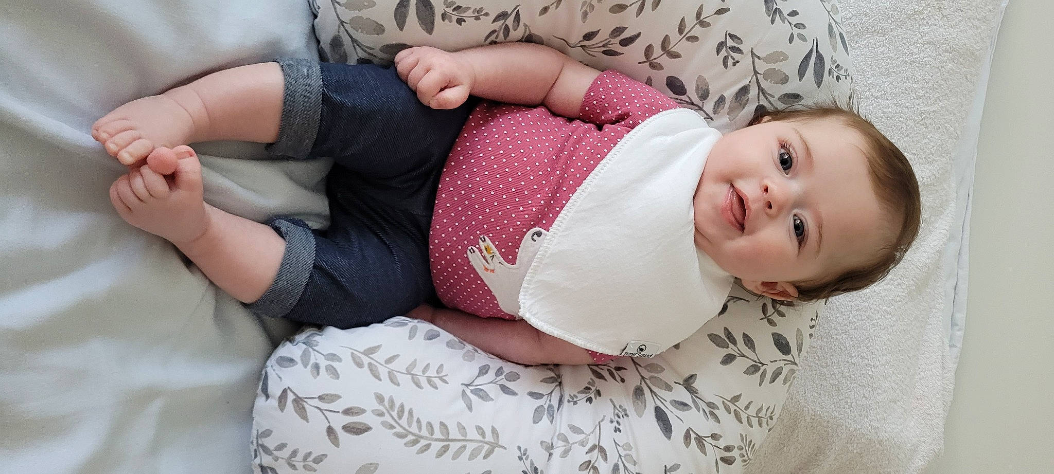 Isla joined the competition — help win amazing prizes! baby_toddler_clothing, cheek, clothing, comfort, finger, hand, head, human_body, joint, leg, lip, mouth, neck, outerwear, person, pink, skin, sleeve, smile, textile