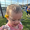 Ellie is registered to the contest to win money with this photo: child, cute, dandelion, daylight, flower, grass, grass_field, happy, nature, outdoor, park, person, pink_dress, playground, portrait, summer, sunny, swing, toddler, young_child