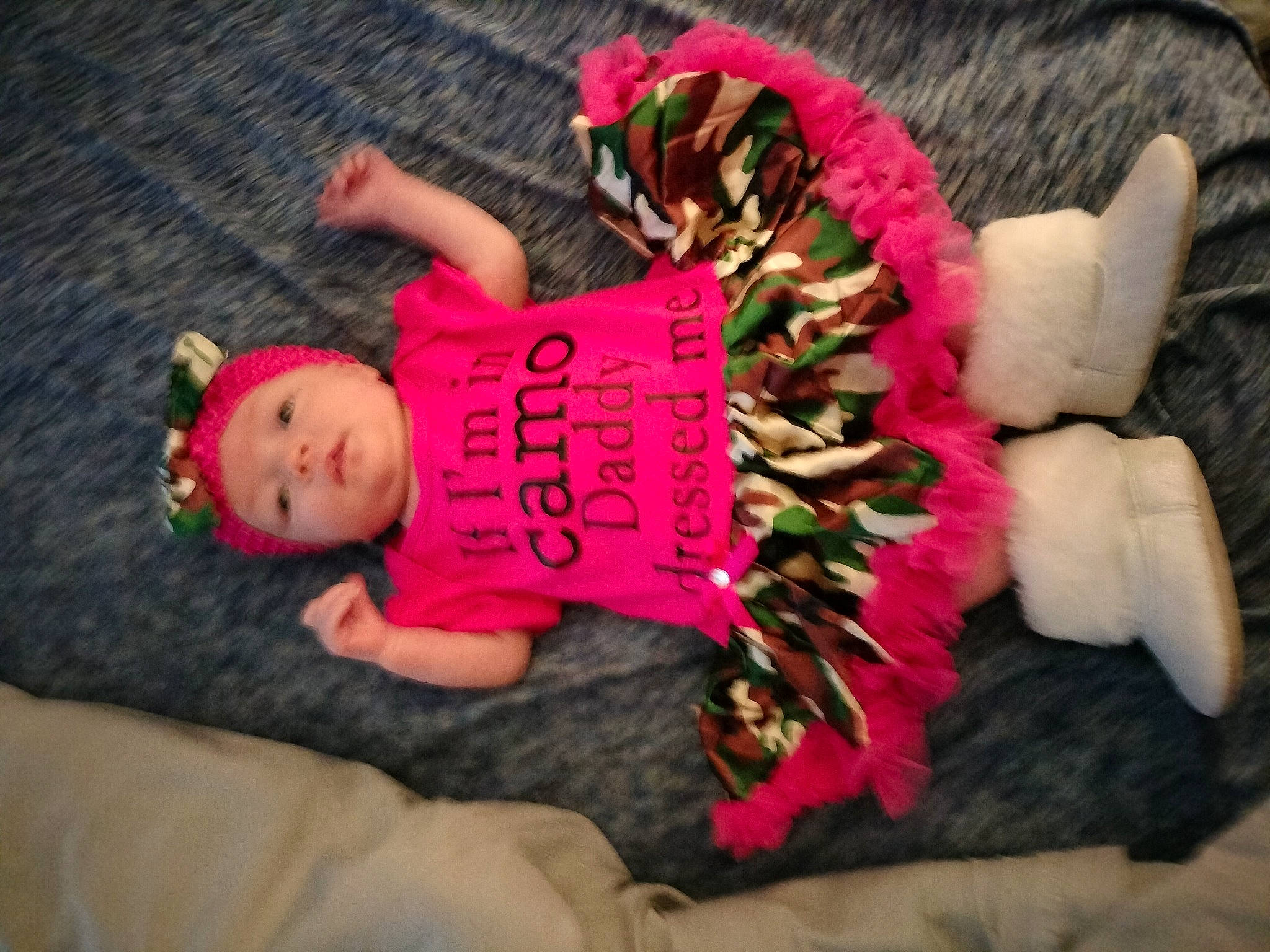 Angel is registered to the contest to win money with this photo: arm, baby, baby_toddler_clothing, child, comfort, event, finger, fun, glove, grass, hand, headwear, magenta, mammal, nail, person, pink, plant, textile, thigh