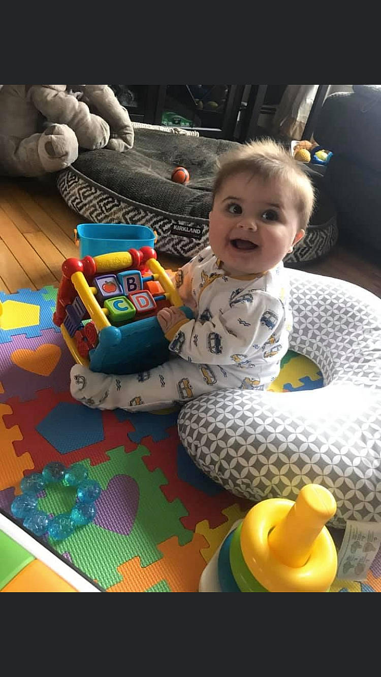 Ryder is registered to the contest to win money with this photo: baby, baby_playing_with_toys, baby_toys, child, fun, person, play, product, sitting, toddler, toy