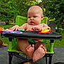 baby, child, high_chair, toy, outdoor, greenery, trees, feet, hands, plastic_toy, summer, nature, sunlight, table, snack_bag, infant, cute, chubby, seat, playtime