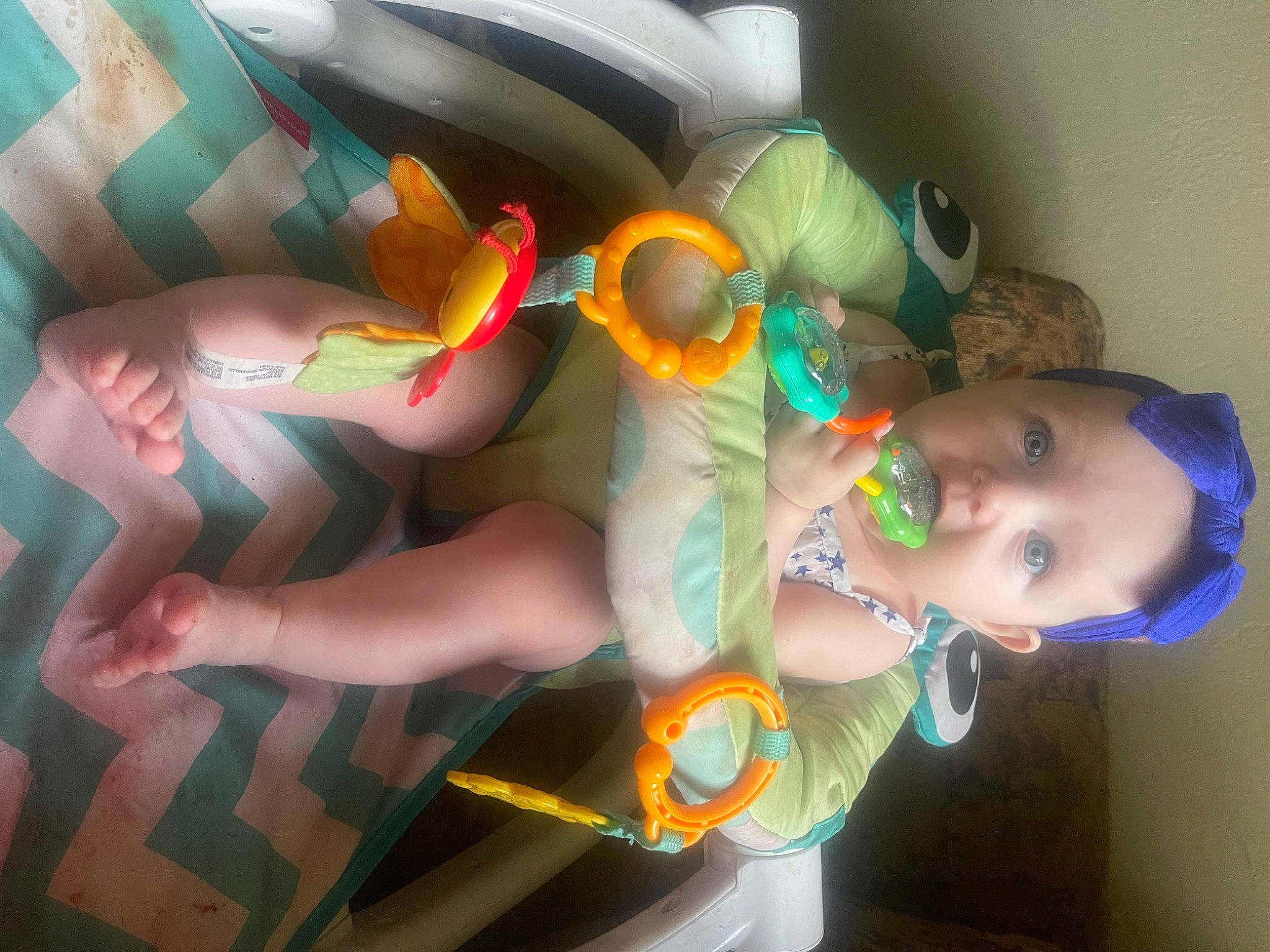 Natalee is registered to the contest to win money with this photo: arm, baby, baby_toddler_clothing, child, eyewear, finger, fun, glasses, goggles, hand, hat, human_leg, mouth, nail, pattern, person, skin, sunglasses, surprise, thigh